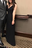 Wore this to my boyfriends military formal. I ordered a small because they were sold out of extra small and I was on a time crunch for a decent dress. The small fit a little loose, but I could've pulled it off if I wasn't so short. I ended up getting the dress altered for length and around my waist. The slit fell a little low (right on my knee) so it was kind of useless. - Sarah Z.
