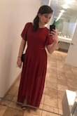 This dress is super cute and classy. I love the open back slit and the way it flows out when you walk. I felt a necklace took away from the sleeves so I wore big gold earrings. Got compliments all night long! - Andrea L.