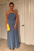 I ordered two long dresses in same color and this one got a lot of "YES" votes from my friends. The front is cute and classy, the back is very revealing but flattering. The only thing is that me being 5'11 the skirt portion was still very long even when I was wearing heels and it felt pretty heavy. I am sure you could shorten this and make it work. I only returned this because I found something better on Lulus with a slit in the skirt. - Katrina E.