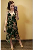 I wore this dress as a wedding guest and received so many compliments! The waist is a little tight and has no give stretch-wise, which gives a very flattering shape but was a little uncomfortable sitting down for dinner. The front was very loose fitting around the bra area (maybe just due to my bra size), so I sewed it in place together and wore those sticky cups in place of a bra. All in all, amazing dress and I felt great. A little personal sewing goes a long way! - Brittani H.