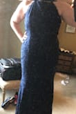 I am in love with this dress. It fits so well, and I went by the measurements. So elegant and more than I hoped for. Fantastic quality. It is a bit long but not too long. I have on small heels, and it's perfect. I'm 5'8" and a US size 14. I ordered XL. - Jennifer P.