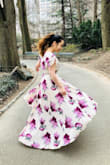 ENCHANTING. The perfect word to sum up the entire feeling of this dress. Whether you're looking for a Spring/Summer dress to wear to a wedding, bridal shower, or a walk through the vineyards, this dress will leave you feeling like a Disney Princess. - Jennifer S.