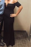 This dress is EVERYTHING. One of the best gowns I have ever worn. It fit like a glove and was beautiful on!!! I was a little uncomfortable with how much cleavage  was shown so I used double sided tape to make sure there were no slip ups. I would recommended the dress!!! - Maureen K.