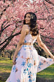 I wanted a flowy, flowery, but not too flowery dress and this is the perfect amount! It is a little bit large in the waist, but it was the perfect amount because when I did eat, it didn't make me look like it was tight on me. I got so many compliments and stares as I swooshed around. Get this dress! Won't regret it, didn't even have to wear a bra! ;) - Michelle G.
