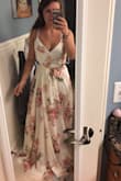 Loved the pattern and the slit down the leg but it was very difficult to get on. It has a tie on the inside like a robe and a snap on the top and I just wasn't a fan. The top just didn't lay right on me with the snap. - Carli K.