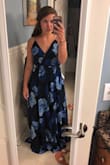 I AM OBSESSED WITH THIS DRESS!!! I love everything about it! I ordered it for prom which isn't for another month but I just keep trying it on because I love it so much- I just want to wear it all the time!! It's sooo beautiful and so comfortable. The flowers give it such a soft feminine look and the open back is so pretty. Everything about it is so beautiful I can't even put it into words. - Carli K.