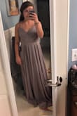 I'm usually a small at Lulus but they were out of smalls when I ordered this so I thought I would try and extra small but I couldn't even zip it (it's unzipped in the back in the picture). The color didn't go well with my skin tone but I love the look of the dress. It's very flowy and really pretty. - Carli K.