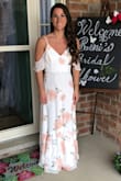 This dress was perfect for my bridal shower, the fit was spot on and everyone loved it. Had to get it shortened as it was dragging a lot. - Remi B.