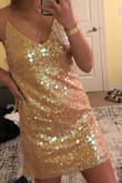 I loved the look of this dress online. Super fancy and outgoing. When I received the dress I noticed it was a different color. On top of that, it fit large and if you order this dress and end up needing to adjust the straps, you won't be able to. - Makenna G.