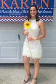 I wore this dress last May for my college graduation. It was super cute! I did have to get it altered slightly. I ordered a large and it fit pretty much everywhere except at the bust. My seamstress just cut the straps a little shorter and then sewed them back together. It was no longer loose at my chest! - Karen T.