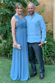 I wore  this dress to a wedding and it was great. I did order a size up small even though I'm usually a medium because of the reviews. It fit very well. It was very long but I just chose to wear a taller shoes. - Laura T.