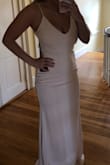 I got this dress in blush, I absolutely love it!! I got it to wear to prom and the small fits well, but if you are looking for it to be tighter I would go with the XS if you usually do small. Great material and really supporting I love this dress. :) - Molly O.