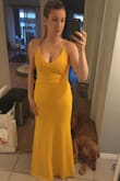 The dress is a bit long but with a heel 1" or taller, it's perfect. Delivery service was very poor and came with unexpected additional charges. I will double think before ordering from here again. - Erin S.