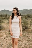 Cute dress that I wore for senior pictures. I love the open back! It is very flattering and semi-comfortable. Probably rides up if youre going to be sitting. Not sure how that will work for graduation but I'll make it work! - Lillian M.