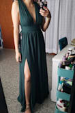 I bought this dress for a special occasion event and it fits perfectly! I'm 5'3 and it is the perfect length with 4 inch heels. The only thing that bothers me is that the zipper gets a little stuck on the way up, but other than that, it's great. Also, the quality of the material is amazing. I can't wait to wear it!! - Carmina P.