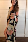 As soon as I slipped into this beautiful and elegant dress, I knew it was perfect for me! The material feels light and airy, the sleeve length is perfect, it fits so well in the waist, and I can wear flats or heels with the dress length. The slit allows a little peek of leg to be seen which adds a romantic touch. I love the fit and look of this beautiful new dress! - Valerie H.
