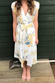I LOVED this dress. I received so many compliments in this dress and loved the way it fit on me. It looked exactly like the picture and I loved the colors and quality of this dress. I would 100% recommend to anyone thinking about buying this dress!! - Julia E.