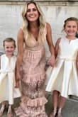 Love this dress! I got a million compliments. It fit great even tho I'm a little busty. It's very long but perfect with heels. - Leslie M.
