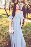 This dress is exactly what I had in mind for my engagement pictures! It's flowy and a great material! It runs a little long. If I was wearing it as a bridesmaid dress or something like that I would definitely get it hemmed or make sure I had tall enough heels. Definitely recommend! - Lexi C.