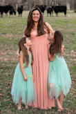 I ordered this dress to use at a photo shoot with my daughters. We wanted something flowy and this was perfect. The only downside would be the top. It's extremely low! I had a hard time finding anything to wear that wouldn't show and since there is absolutely no padding or lining I felt I needed something. So we ended up working around the showing bra with my hair and the angle of the shots. But all in all it was a great dress. I wore wedge sandals and the dress was still long enough to cover my shoes and just drag the ground. - Candice W.