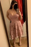 This dress fits me perfectly. I wear a 32 G bra and this dress looks amazing on me. The dress has adjustable straps and the dress itself is very supportive. I can go braless in this dress which is amazing. The only thing I don't like about this dress is how poofy the skirt is. There is a slip layer, a layer of tulle, then the layer of lace. I guess I could cut the tulle out of the dress, but I don't want to make a risky alteration on an expensive dress. I also wish this dress came in a mini length. Having this full of a skirt and the length of the skirt, makes me look like I am swimming in the dress. I debated keeping this dress, but this dress looks great on the top. The only concern I have is the lace skirt seems very delicate and would snag easily. The zipper in the back is silver and clunky. It is not a zipper that blends in with the dress at all. It is not smooth and was difficult to zip. Overall I would recommend this dress to busty girls. - Kate R.