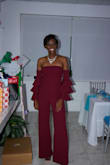 Loove this jumpsuit. It's very flattering and the sleeves add just the right amount of pizzazz. My only issue is that the top was a little loose considering my small bust so I had to have it adjusted. Was perfect for my office party! - Jan A.