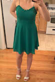 This dress is super cute for spring! The green color really pops, and the material is very flowy and lightweight. The fit is also very flattering, but I am going to have it shortened a few inches for a more flirty fit (I'm 5'1"). Also, the tie straps are kind of annoying because it's hard to get them to be the exact same length, so I'm going to have my tailor sew them in as normal straps. Other than that, I'm really happy with this! - Amanda E.