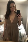 This dress had me concerned because reviews can be quite mixed and how it fits on ladies with smaller waists than me was mixed. The band DOES NOT stretch so consider that when you order. It's a top clasp and zip up on the back of the dress. Overall, I am so excited to wear this as a bridesmaid for my friends wedding. I am very happy it fit me, but I read the reviews a lot before ordering my size. This dress makes you feel like a goddess. :) - Jenna R.