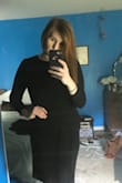 I loved this dress immediately. The fabric is soft, but not overly so. It falls to the knees, but if you have a tummy, like me, you can bunch it up slightly around the stomach for camouflage with it still being an appropriate length. It's somehow casual and formal at the same time. I'm at a higher weight than I normally am, but even when I lose it, I think the dress will still look great. Not clingy at all. Love this dress. - Chelsea T.