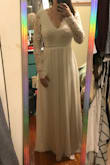 This dress is absolutely beautiful and I am so happy with the way it fits! I ordered it for my wedding rehearsal dinner. I have been working out and trying to lose weight, which may be why it fits a little more loosely than it typically would. I am going to get it fitted to take in the arms/chest a bit but besides that, it is absolutely perfect! I always have trouble finding dresses long enough but the dress goes all the way to the floor. - Lindsey R.