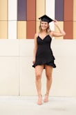 I absolutely love this dress! It fit like it was made for me. I especially liked how the straps were adjustable and that it was longer in the back. I wore this for my college graduation pictures and will be rewearing it for the ceremony! - Payton H.