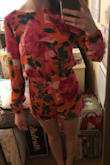 The fit of this romper was weird. The top was really baggy if you weren't standing up completely straight. At the same time the waist was snug. I purchased an XS although my measurements are between a size XS and S. I was disappointed with how loose the top was. - Annie R.