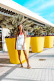 This dress is so comfortable I could literally sleep in it. Pair it with a cute belt and it'll show off more of your waistline. I ordered a medium when I am typically in between a small and medium, so if you are between sizes, order the smaller one because it does have a loose fit. So cute! - Sydney S.