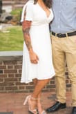 I loved this dress, was getting married at the courthouse so was looking for a little more casual dress and this one was the perfect one! Got endless compliments. The only thing is that the bust area is kinda small so I had to go with the size medium and even then, I had to put on fabric tape to prevent too much cleavage. - Melannie G.