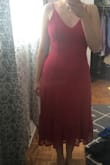 This is such a fun dress! I love the bright color, and the lace detailing adds interest to a simple silhouette. I am normally a medium on bottom and small on top, but this dress fits me really well everywhere. It accentuates the figure without being too tight. The fabric is slightly stretchy and very forgiving. The straps are adjustable as well. I do wish the hem of the dress fell closer to the knee; it feels just a tad too long on someone who is shorter. But, I think wearing heeled sandals will make it less noticeable. - Colleen W.