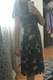 This is a comfortable yet elegant dress that could be dressed up or down. The wrap cut is super flattering and can be adjusted to fit your frame. I am normally a small on top and a medium on bottom. The small in this dress fit perfectly. It hits me slightly below the knee, making it an appropriate dress to wear to nice functions. I also love the flutter sleeves that open on the sides adding a bit of whimsy. The only negative I see is the dress arrived very wrinkled so it may not do well on a long trip! - Colleen W.