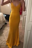 I am always nervous about ordering dresses online since I am so tall. This one fit perfectly and I had room to spare at the hemline! I am able to wear heels and the dress still hits the floor. I am obsessed!

(First photo is dress without heels, second is with heels) - Renee W.