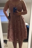 This dress is beautiful and exactly what I was looking for. The color, the material, the fit it's all just perfect.
I'm a size 4 in dresses, size 27-28 in jeans. I went with a Medium because of my chest and glad I did. The fit is great. Slimming in the waist and loose fitting in the hips. This dress is heavier than most but you can't beat the quality or fit. - Brittany P.