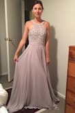 The quality is as good if not better than it appeared online. The material is nice and the skirt is heavy and feels luxurious and flowy. The color appears a bit more purple than it looked online, but it is still grey. Great value for a bridesmaid dress! - Nicole K.