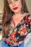 Though it is a bit snug (I have gained some weight recently tho) this bodysuit is incredibly flattering. Loosely fit with great movement. I got many compliments. Pair it with a washed pair of Levis and bold red lip and sandal heel and you have the perfect date night look. My favorite go to look for when I go out now. Would buy more colors if they were available. - Katherine N.