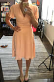 I am a petite human with a larger bottom (s/m) than top (xs/s), so finding the right style/fit is always a challenge. The wrap on this dress allows for you to pull it tighter and make adjustments to the top portion while not being tight at all on the bottom area. Very comfortable and flowy -the color is great for spring and looks just like it does in the photo. Recommend fa sho!
I tied it a little differently than the photo, and I'll probably continue to mess with it until I get a bow I like, but it's great for the beach wedding I'm going to in April. - Lisa P.