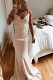 This dress is a beautiful color and makes my stomach look very slim. It shapes and hugs my body perfect and I am so happy! The dress was worn to a prom. - Emma C.