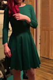 I love this dress, the material is nice and warm which is great on colder nights and the skirt flows nicely. I probably could've sized down but I did not want it to be too tight in the bust area if I wore a push up bra. - Ashley R.