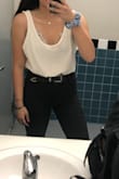 I'm not a bodysuit person usually, I have an athletic build with a short torso, long legs and broad shoulders. This bodysuit is the perfect spring/summer piece and is so easy to dress up or down! I got a size small, and it still is slightly oversized on me, but its so cute!! I have it in both black and white, note that the white one is more cream in person but still goes with everything. - Alena T.