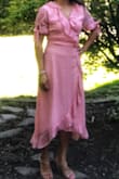 I'm obsessing over this dress right now. I love how it flows. It does show all your bumps so make sure you wear Spanx underneath. But, very dreamy and fiercely feminine. - Miriam J.