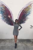I love the hem line on this dress. So cute on around LA.  Very comfortable. Hugs your body. - Miriam J.