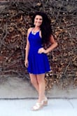 This dress was so perfect I bought it in 3 more colors. I've worn them to bachelorette parties and summer weddings. The material is airy and perfect. The nice thing about the back is you can adjust how tight or loose you want it. - Heather S.