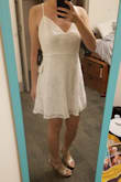 I really loved the lace detailing, but I feel like the top part didn't really look as flattering as it did on the model. Since I have a small chest, it is much too loose in the bust area and bending down would have been awkward. I shortened the straps to bring up the neckline and the whole dress, but the result is that the top part of the dress (where the straps begin) is now higher than on the model. Even so, there's an awkward gap where cleavage should be but on me is just empty space. I think if the neckline was just a tad less angled, it would be perfect. - Po T.