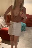I can't even begin to describe how much I love this skirt. I originally bought it in black then waited for months for it to come back in stock in white because I loved it so much. It hugs the body perfectly without flaring out at the bottom like some mini skirts do. It's cute for a night out or dinner/brunch but fair warning that it'll ride up if you try to dance in it. And yes, the booty looks good in it. - Adrienne C.