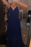 This dress is so perfect! it has a gorgeous train and color! The only thing is it's a little long on me, but I have some pretty high heels to wear with it so I'm not mad about it. It fits perfectly and I love it so much! - Ainsley T.